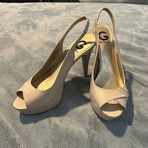 Guess heels.  Size 8 1/2. Sand color